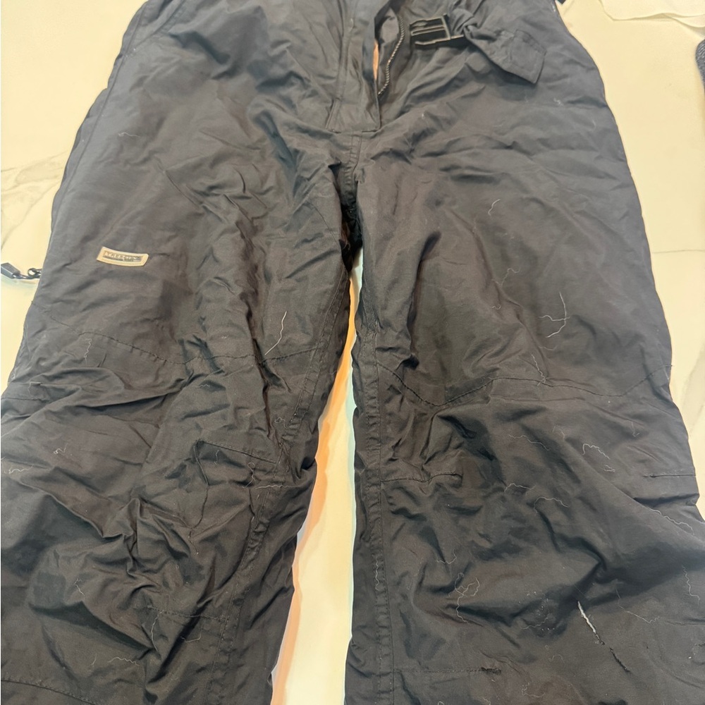 Women’s medium ski pants! Lightly worn, small tear at the knee (in photo).